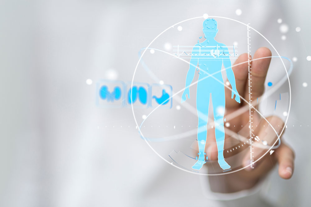 Zwei Finger drücken auf ein grafisches Symbol in der Form eines Menschen und menschlicher Organe